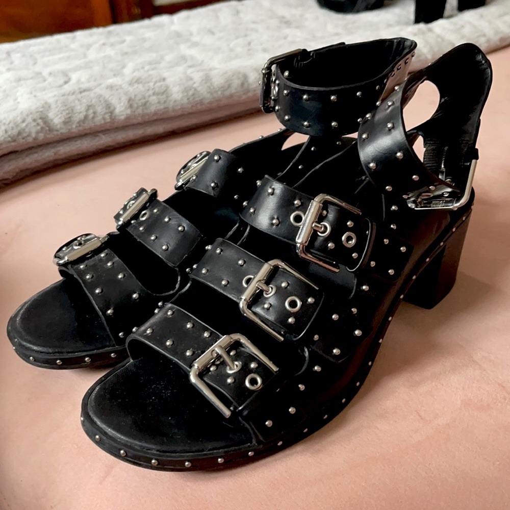 Studded buckle heels